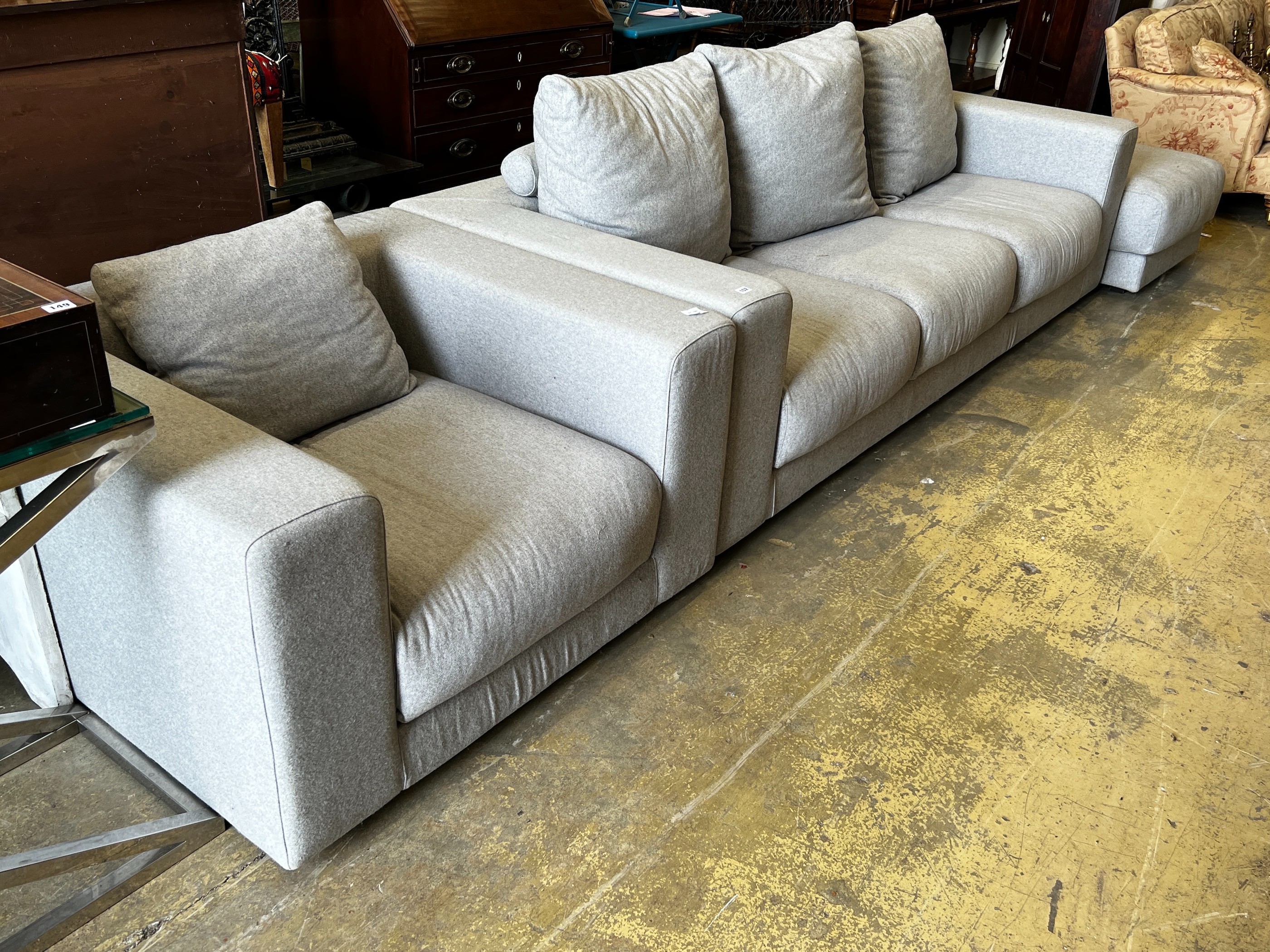 A contemporary Perobell grey fabric sofa, length 235cm, depth 98cm, height 88cm armchair and two foot stools